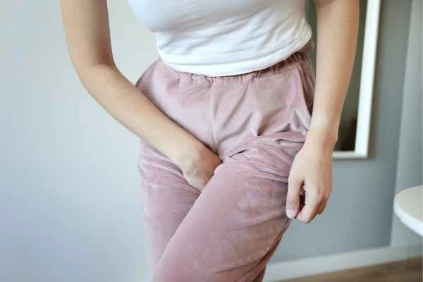 woman running for the toilet because of urinary incontinence East Grinstead